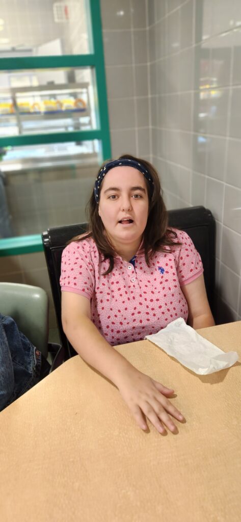 Female student sitting in the school cafeteria