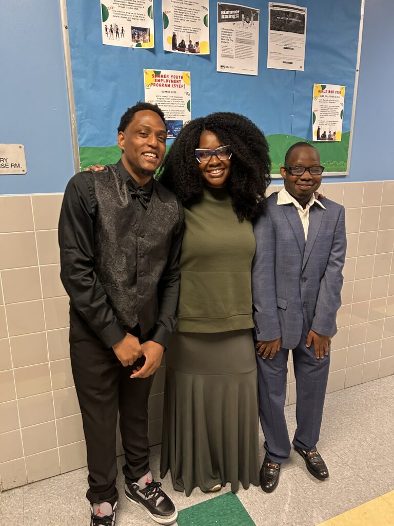 Teacher with 2 students dressed for prom