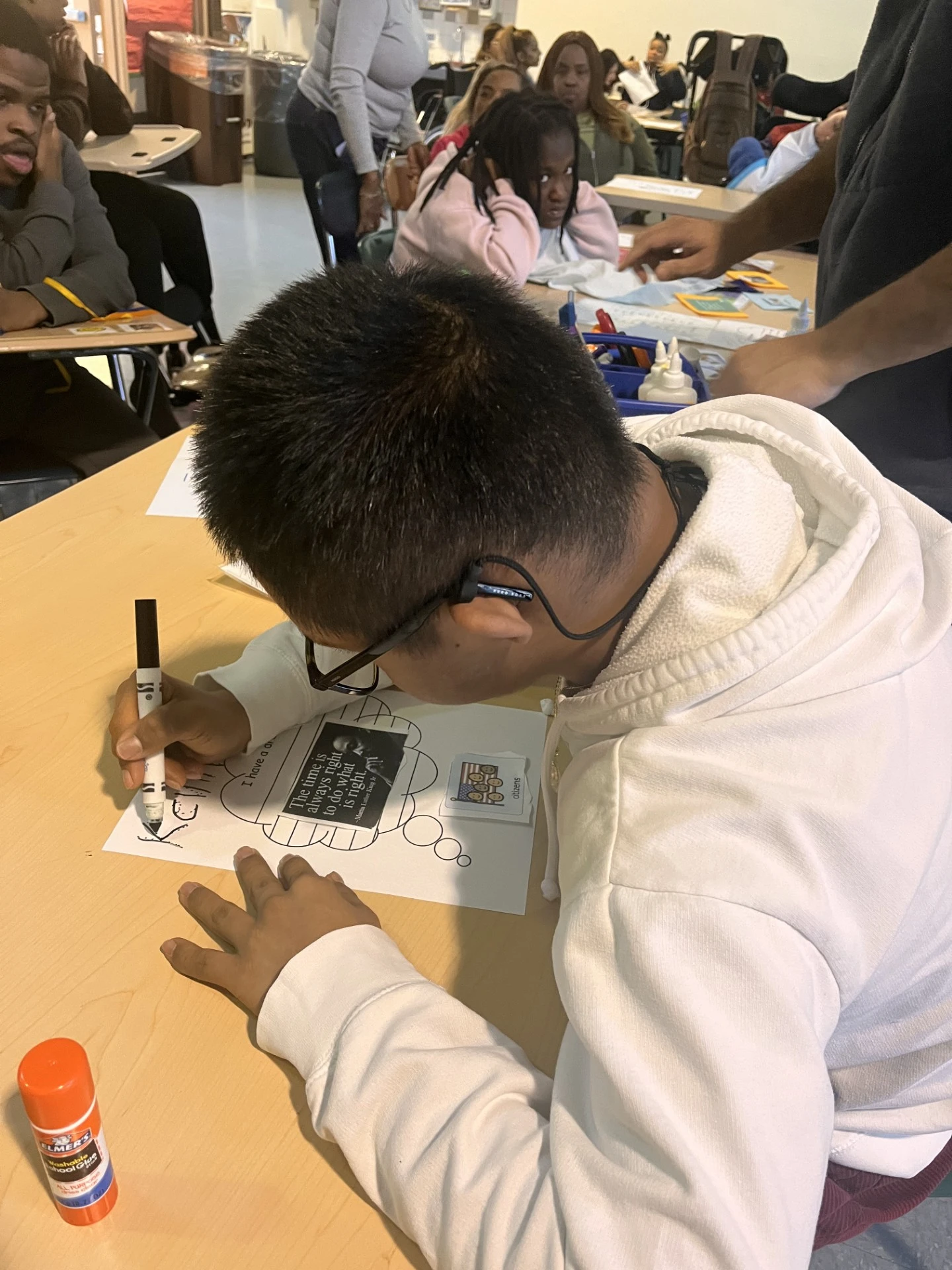 student completing a worksheet