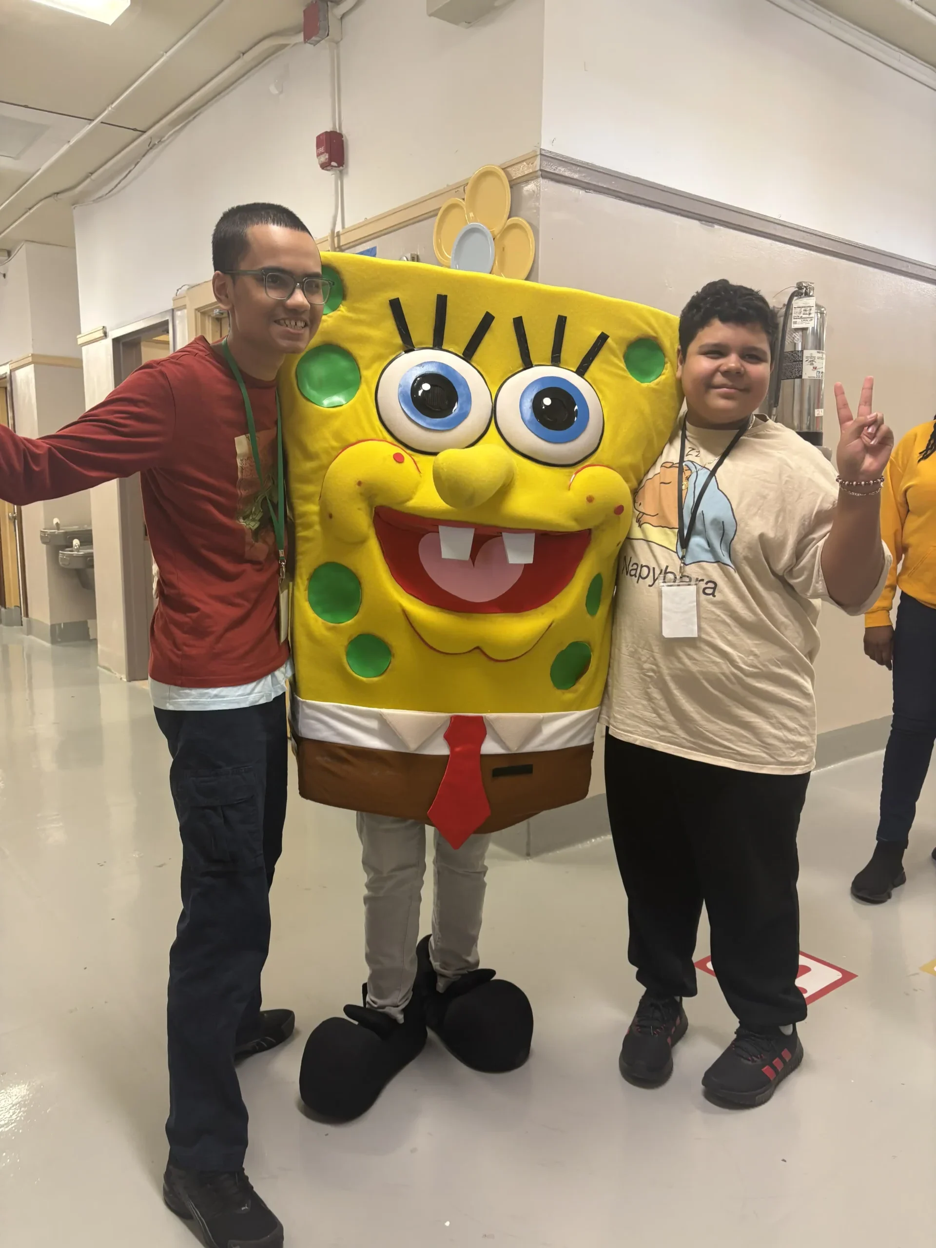 two students and the character sponge bob